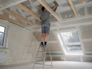 CareMaster contractor rebuilding an attic after a fire in Holly Springs NC
