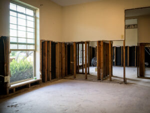 Goldsboro NC living room with walls partially removed for structural drying