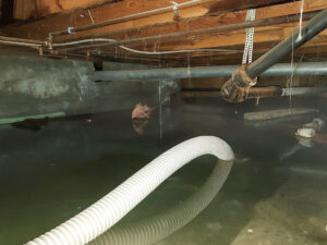 water extraction from crawl space after storm damage in Kinston NC